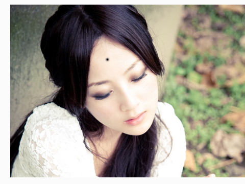 女性前额有痣的图解